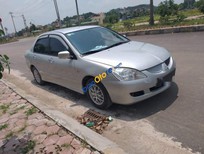 Bán xe oto Mitsubishi Lancer   2005 - Cần bán gấp Mitsubishi Lancer sản xuất 2005, màu bạc, xe nhập 