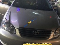 Cần bán xe Toyota Corolla altis   2005 - Cần bán xe Toyota Corolla altis sản xuất năm 2005, màu vàng, nhập khẩu nguyên chiếc