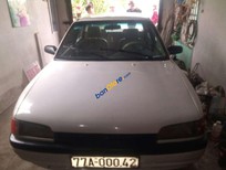 Cần bán Mazda 323   1995 - Xe Mazda 323 năm 1995, màu trắng, nhập khẩu