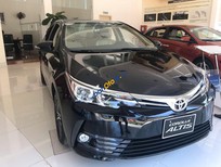 Cần bán Toyota Corolla altis     2019 - Cần bán xe Toyota Corolla altis năm 2019, màu đen, 731 triệu