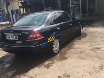 Ford Mondeo   2004 - Bán Ford Mondeo năm 2004, màu đen xe gia đình  