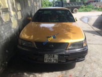 Bán xe oto Nissan Cefiro   1994 - Cần bán gấp Nissan Cefiro sản xuất 1994, màu vàng, nhập khẩu  
