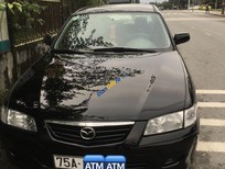 Cần bán xe Mazda 626 2001 - Cần bán lại xe Mazda 626 năm sản xuất 2001, màu đen xe gia đình, 155 triệu