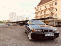 BMW 3 Series 320i 1995 - Cần bán lại xe BMW 3 Series 320i sản xuất năm 1995, màu đen, xe nhập số tự động, 120tr