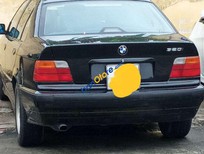 Cần bán xe BMW 3 Series   1997 - Bán BMW 3 Series 320i năm 1997, màu đen, xe nhập