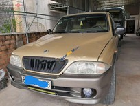 Bán xe oto Ssangyong Musso   2001 - Bán Ssangyong Musso sản xuất năm 2001, màu vàng, nhập khẩu