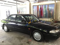 Bán Mazda 626 1996 - Bán Mazda 626 năm 1996, màu đen số sàn 