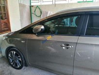 Cần bán xe Kia Rondo MT 2018 - Cần bán lại xe Kia Rondo MT năm 2018, màu vàng, xe nhập  