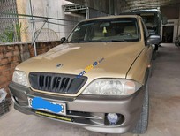 Cần bán xe Ssangyong Musso 2001 - Bán Ssangyong Musso sản xuất năm 2001, màu vàng, nhập khẩu  