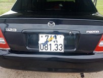 Mazda 323 2002 - Bán Mazda 323 sản xuất năm 2002, màu xanh
