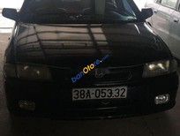 Cần bán Mazda 323 1999 - Bán ô tô Mazda 323 năm sản xuất 1999, màu đen, xe nhập số sàn giá cạnh tranh