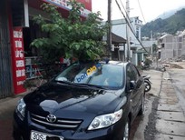 Cần bán Toyota Corolla 2009 - Cần bán Toyota Corolla năm sản xuất 2009, màu đen, xe nhập