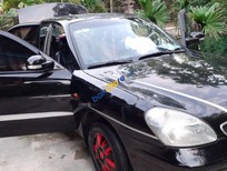 Bán xe oto Daewoo Nubira II 1.6 2002 - Cần bán xe Daewoo Nubira II 1.6 sản xuất năm 2002, màu đen xe máy nổ êm