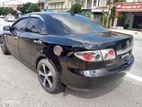 Mazda 6 2.0 MT 2004 - Xe Mazda 6 2.0 MT sản xuất năm 2004, màu đen 