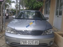 Cần bán Ford Laser 2004 - Cần bán lại xe Ford Laser sản xuất năm 2004, màu bạc, xe nhập 