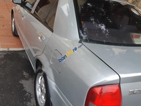 Bán Mazda 323 2004 - Bán Mazda 323 năm 2004, màu bạc, xe cũ