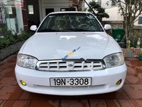 Cần bán xe Kia Spectra 2004 - Bán ô tô Kia Spectra sản xuất năm 2004, màu trắng