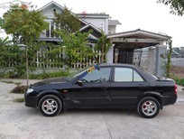 Bán Mazda 323   2003 - Bán xe Mazda 323 1.6 năm 2003, màu đen còn mới