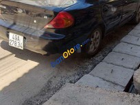 Bán xe oto Kia Spectra    MT 2004 - Cần bán lại xe Kia Spectra MT sản xuất 2004, nhập khẩu nguyên chiếc, giá tốt