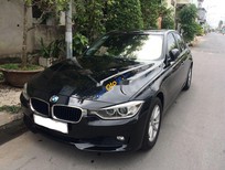 BMW 3 Series  320i   2013 - Cần bán xe BMW 3 Series 320i sản xuất năm 2013, màu đen, nhập khẩu nguyên chiếc số tự động