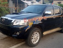 Bán Toyota Hilux 3.0G 4x4 MT  2011 - Cần bán xe Toyota Hilux 3.0G 4x4 MT năm 2011, màu đen xe gia đình, giá chỉ 425 triệu