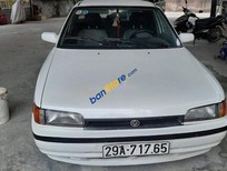 Cần bán Mazda 323 1998 - Cần bán xe Mazda 323 sản xuất năm 1998, màu trắng 