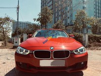 BMW 3 Series 320i  2012 - Cần bán xe cũ BMW 3 320i sản xuất năm 2012, màu đỏ, nhập khẩu