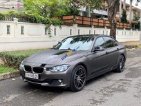Cần bán BMW 3 Series   2014 - Cần bán gấp BMW 320i đời 2014, xe nhập 