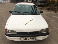 Cần bán Mazda 323   1996 - Cần bán lại xe Mazda 323 sản xuất 1996, màu trắng