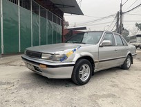 Bán xe oto Nissan Bluebird 1990 - Cần bán xe Nissan Bluebird năm 1990, màu bạc, nhập khẩu