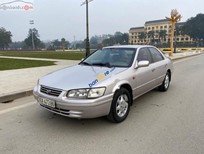 Cần bán xe Toyota Camry   3.0 V6 2002 - Cần bán xe Toyota Camry 3.0 V6 năm sản xuất 2002, màu bạc số sàn, giá tốt