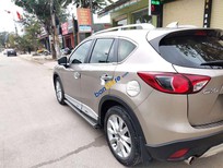 Cần bán Mazda CX 5   2014 - Cần bán gấp Mazda CX 5 sản xuất 2014, giá chỉ 605 triệu