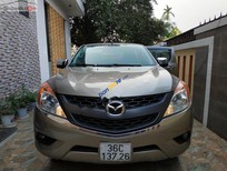 Cần bán Mazda BT 50 2015 - Cần bán lại xe Mazda BT 50 năm 2015, màu vàng, xe nhập số sàn