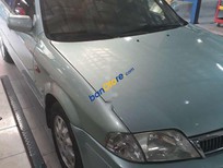 Bán Ford Laser   2002 - Bán Ford Laser sản xuất năm 2002, màu bạc, giá tốt