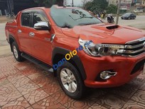 Cần bán xe Toyota Hilux 3.0G 4x4 AT 2015 - Cần bán gấp Toyota Hilux 3.0G 4x4 AT đời 2015, màu đỏ, nhập khẩu