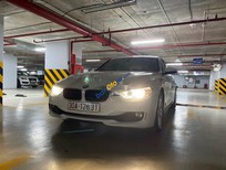 Cần bán BMW 3 Series  320i  2014 - Bán BMW 320i năm 2014, màu trắng, nhập khẩu nguyên chiếc xe gia đình