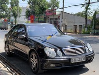 Cần bán Mercedes-Benz E class 2004 - Cần bán lại xe Mercedes năm sản xuất 2004, màu đen