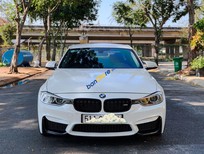 Cần bán xe BMW 3 Series 2014 - Cần bán BMW 3 Series sản xuất 2014, màu trắng, nhập khẩu