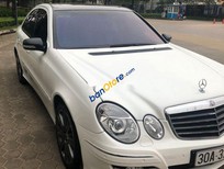 Cần bán Mercedes-Benz E class E500 AMG 2004 - Cần bán xe Mercedes E500 AMG năm sản xuất 2004, màu trắng, xe nhập, 300tr