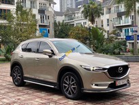 Cần bán Mazda CX 5 2017 - Cần bán Mazda CX 5 sản xuất năm 2017, màu nâu