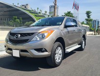 Mazda BT 50 2015 - Cần bán xe Mazda BT 50 2.2L 4x2 AT 2015, màu vàng, nhập khẩu chính hãng, giá chỉ 435 triệu