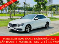 Bán xe oto Mercedes-Benz E class 2020 - Quốc Duy Auto - Mercedes E200 sport trắng/nâu 2020 siêu mới - trả trước 750 triệu nhận xe ngay