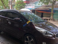 Bán xe oto Kia Rondo 2016 - Cần bán xe Kia Rondo đời 2016, màu nâu còn mới, giá 505tr