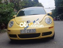 Bán Volkswagen New Beetle   2007 - Cần bán xe Volkswagen New Beetle sản xuất 2007, màu vàng, nhập khẩu nguyên chiếc