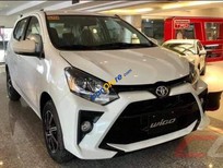 Cần bán Toyota Wigo 2021 - Bán Toyota Wigo giá tốt, tặng full phụ kiện, hỗ trợ 80% giá trị xe lãi suất thấp, đủ màu giao ngay, xử lí cả nợ xấu