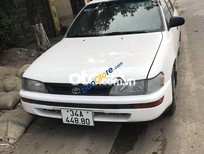 Cần bán xe Toyota Corolla 2002 - Cần bán lại xe Toyota Corolla đời 2002, màu trắng, 65 triệu