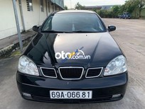 Cần bán Daewoo Lacetti   2005 - Xe Daewoo Lacetti năm sản xuất 2005, màu đen còn mới, giá chỉ 140 triệu