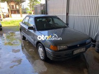 Cần bán xe Mazda 323   1994 - Bán Mazda 323 sản xuất năm 1994, màu xám, nhập khẩu