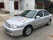 Cần bán xe Kia Spectra   MT  2003 - Cần bán Kia Spectra MT năm sản xuất 2003, màu bạc xe gia đình