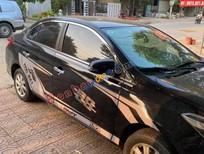 Bán Toyota Vios    2014 - Cần bán lại xe Toyota Vios năm sản xuất 2014, màu đen còn mới